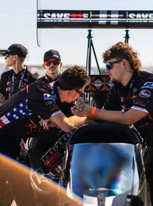 The crew working on the car
