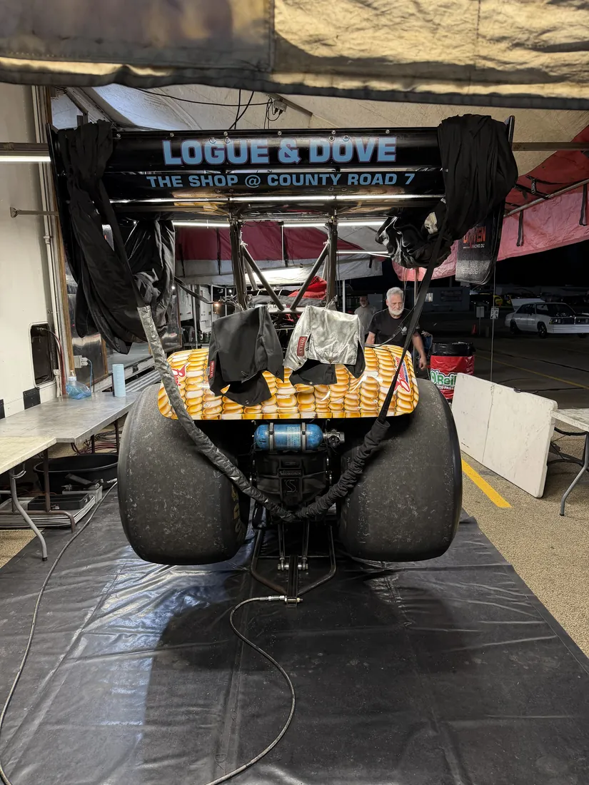 The corn car in the pit under the Logue and Dove wing