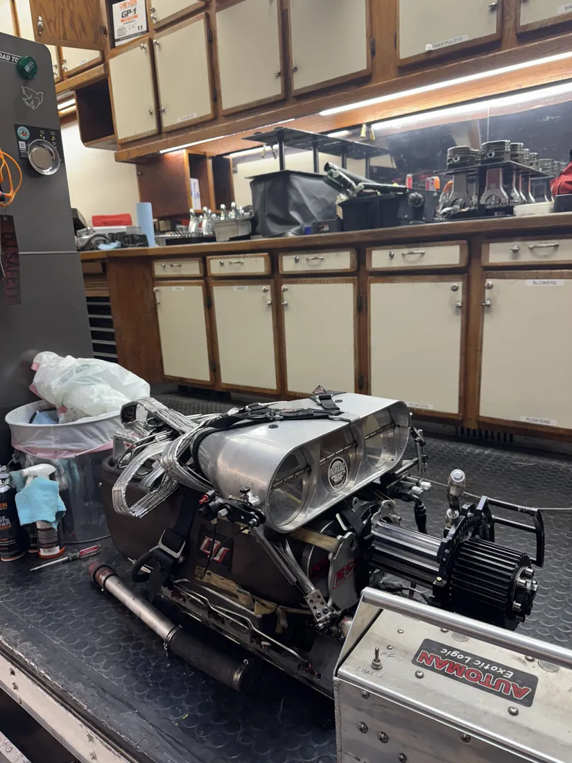 The supercharged nitro engine on the bench in the hauler